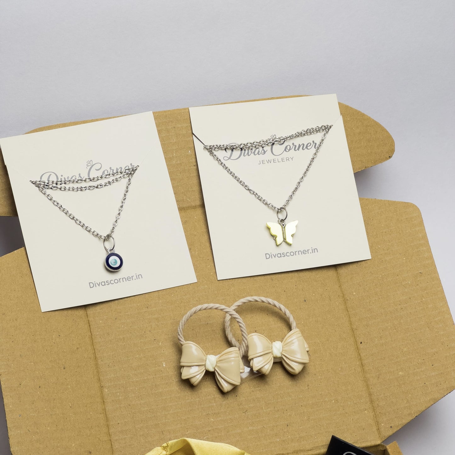 gift box for girls with jewelry, accessories, scrunchie, bracelet, and cute keychain