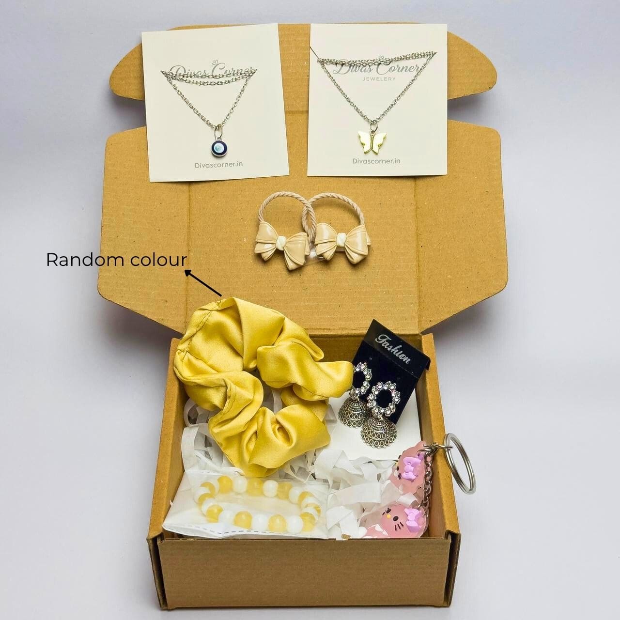 gift box for girls with jewelry, accessories, scrunchie, bracelet, and cute keychain